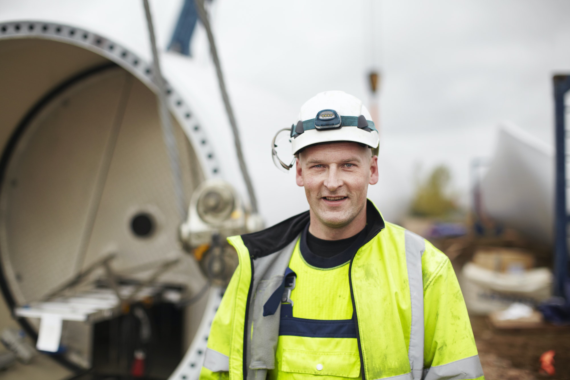 Portrait of an engineer at a wind farm